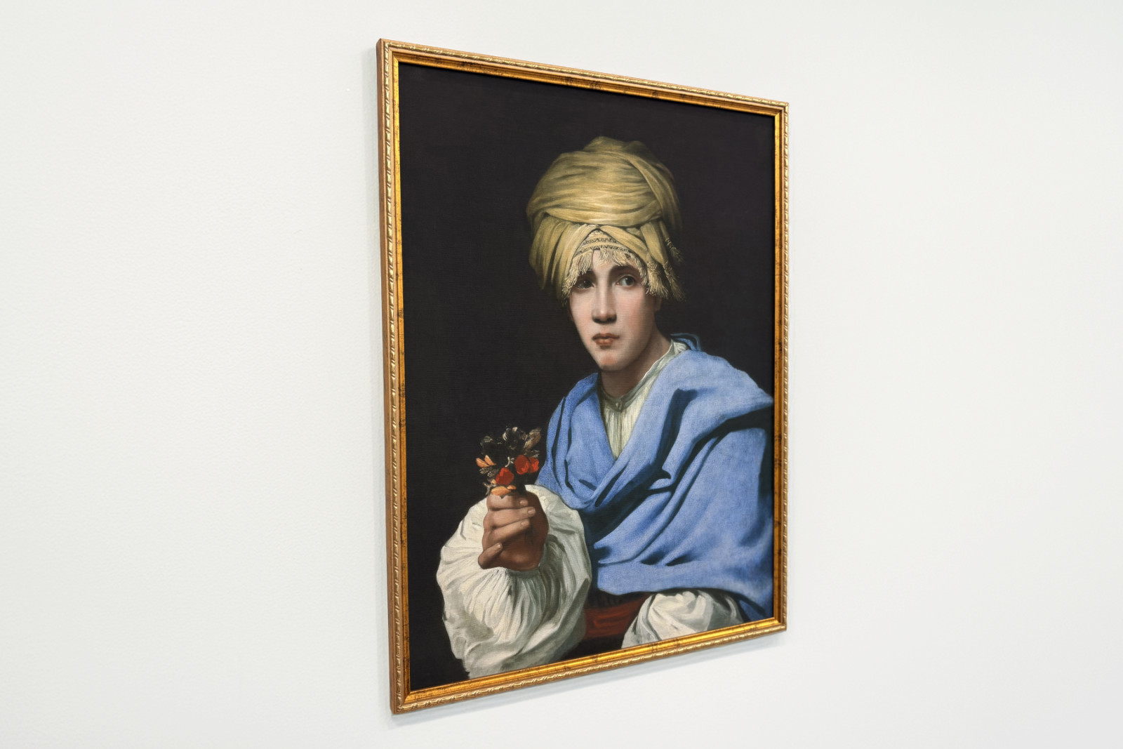 Ragazzo con un turbante che tiene un mazzolino - Michiel Sweerts