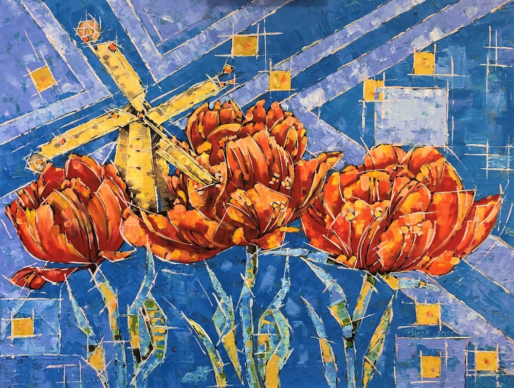 Tulipani dai colori vivaci e mulino a vento da Anda Bieza