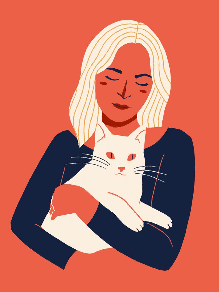 Una donna e un gatto in un
