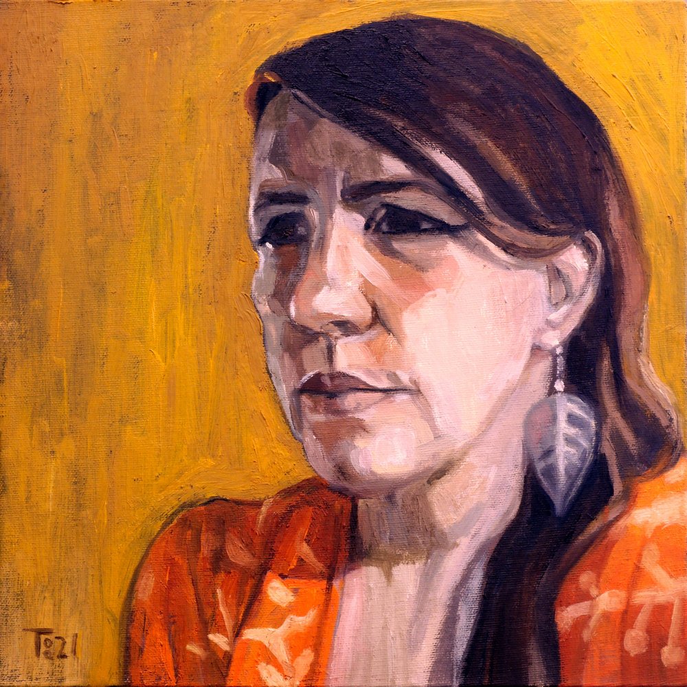 Donna pensierosa in arancione da Tore Bahnson