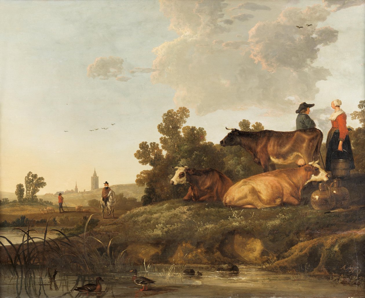 Un mandriano e una lattaia accanto al bestiame, con vista su una città in lontananza da Aelbert Cuyp