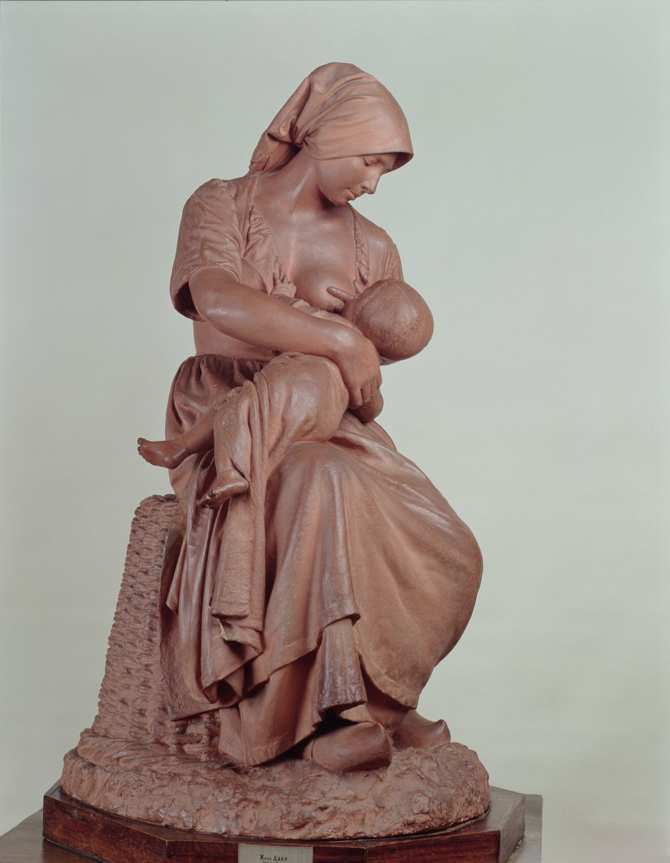 Contadina che allatta un bambino, 1873 (terracotta) da Aime Jules Dalou