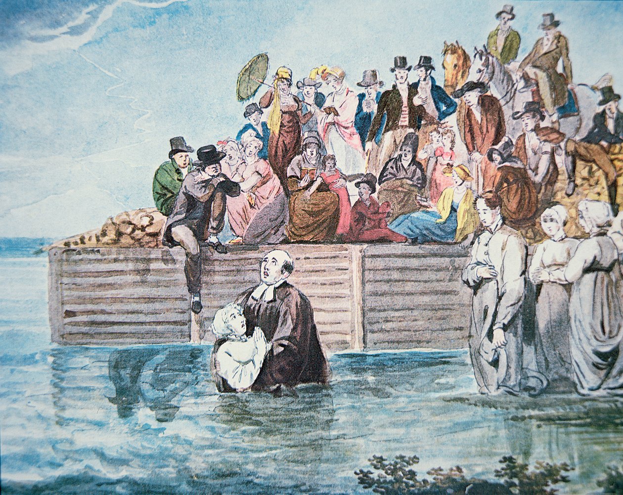 Anabattisti di Filadelfia assistono a un battesimo per immersione in un fiume da American School
