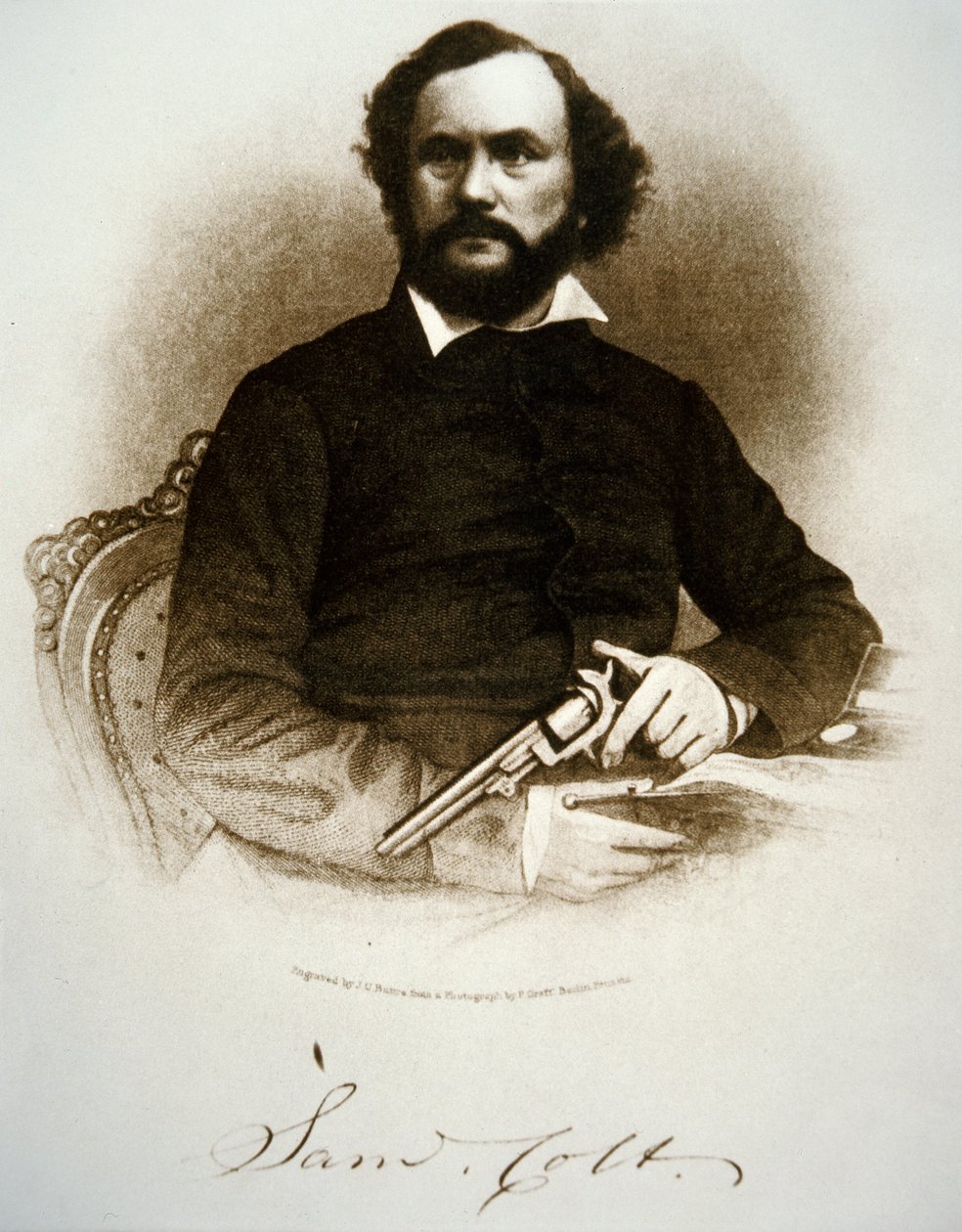 Samuel Colt con uno dei suoi revolver a percussione da American School