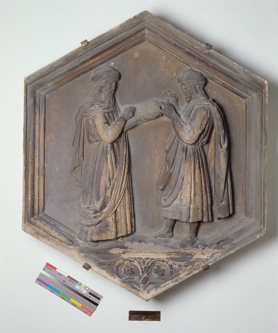 Geometria o Aritmetica, piastrella decorativa esagonale da una serie che raffigura le Sette Arti Liberali, probabilmente basata su disegni di Giotto, c.1334-48 da Andrea Pisano