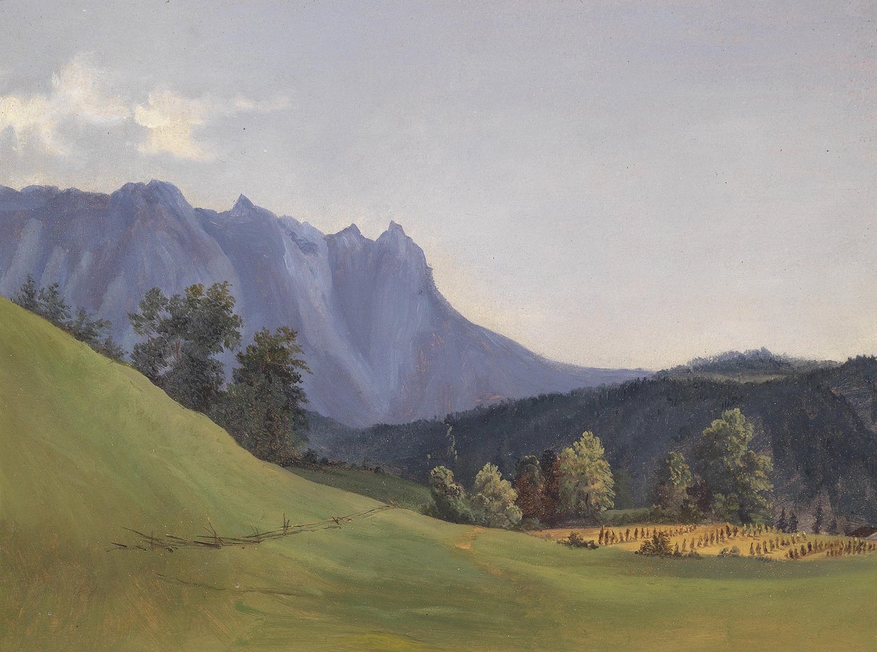Figura accanto a un lago con montagne lontane da Anton Hansch