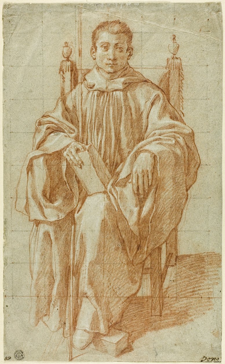 Giovane seduto con l
