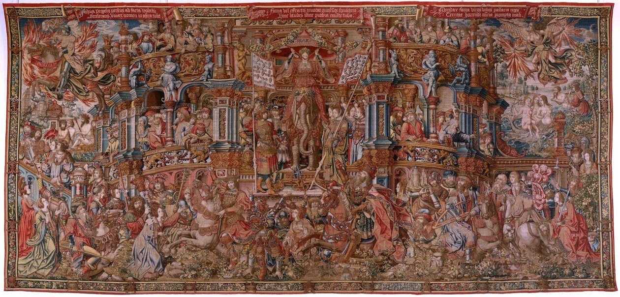 Arazzo fiammingo. Serie Gli Onori. Fama (La Fama). Terzo arazzo della serie. Modello Cartonisti del circolo di Bernard van Orley e Jan Gossaert (Mabuse). Manifattura Pieter van Aelst, Bruxelles. Ca 1550. Tessuto Oro, argento, seta e lana. da Bernard van Orley
