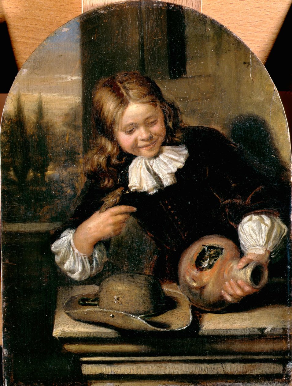 Ragazzo con una brocca e un nido di uccelli da Carel De Moor