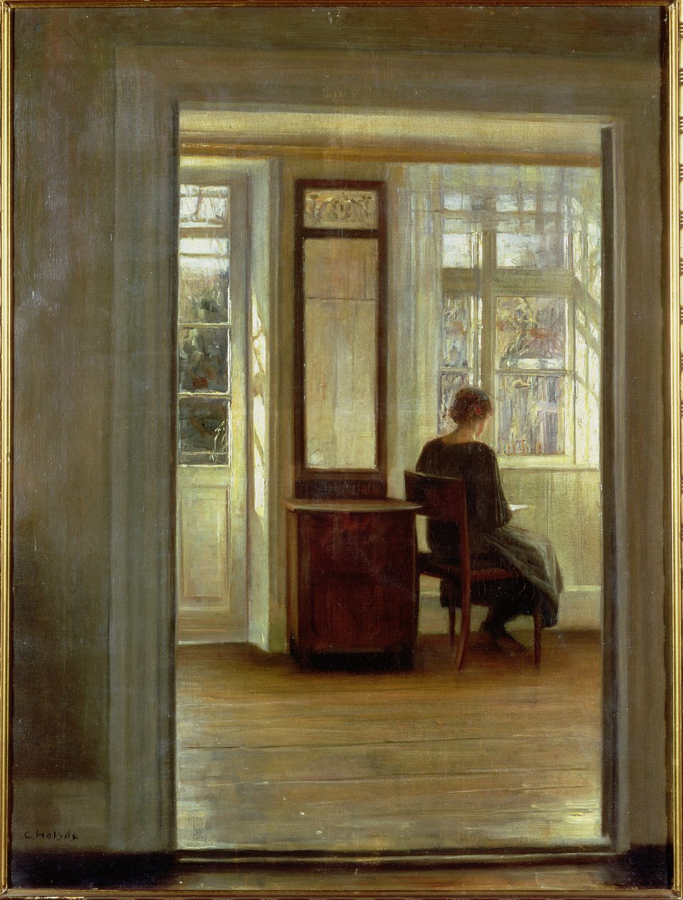 Una signora in un interno da Carl Holsoe