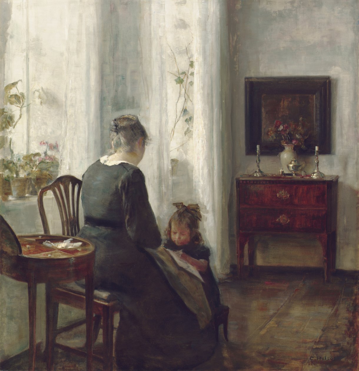 Una madre e un bambino in un interno da Carl Holsoe