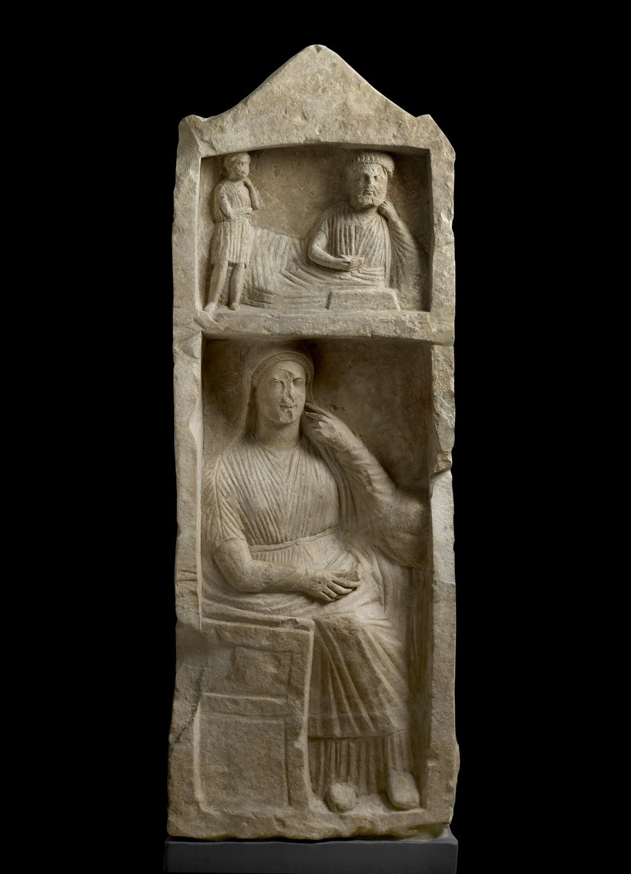 Stele tombale in calcare, rilievo di un banchettante barbuto con assistente ragazzo e una donna seduta, c.325-30 a.C. da Cypriot