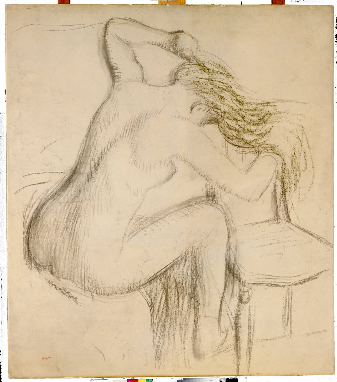 Donna nuda seduta che si pettina i capelli da Edgar Degas