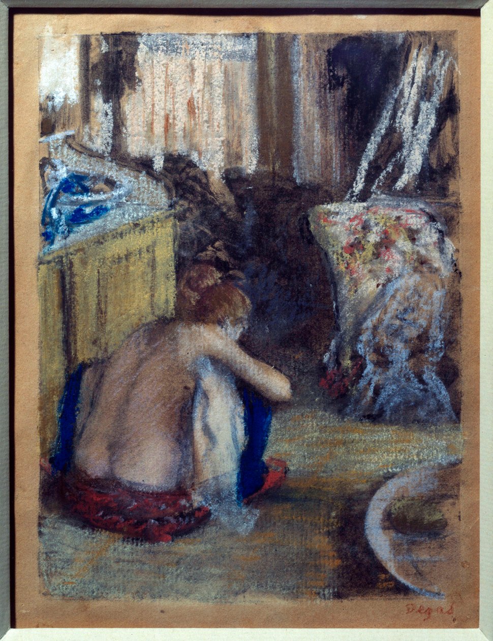Donna accovacciata da Edgar Degas