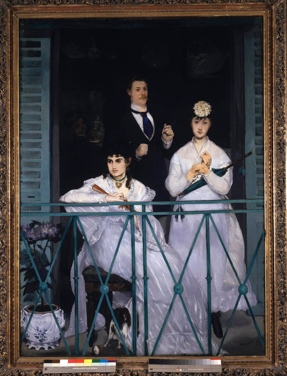 Balcone Due giovani donne con un ventaglio e un ombrello e un uomo con una cravatta. Ritratto di Berthe Morisot, Fanny Claus, Antoine Guillemet e Leon Leenhoff da Édouard Manet
