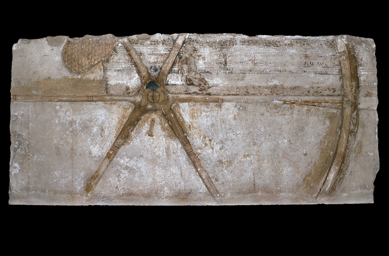 Blocco di calcare scolpito e dipinto con rappresentazione di una ruota di carro, 1353-35 a.C. da Egyptian 18th Dynasty