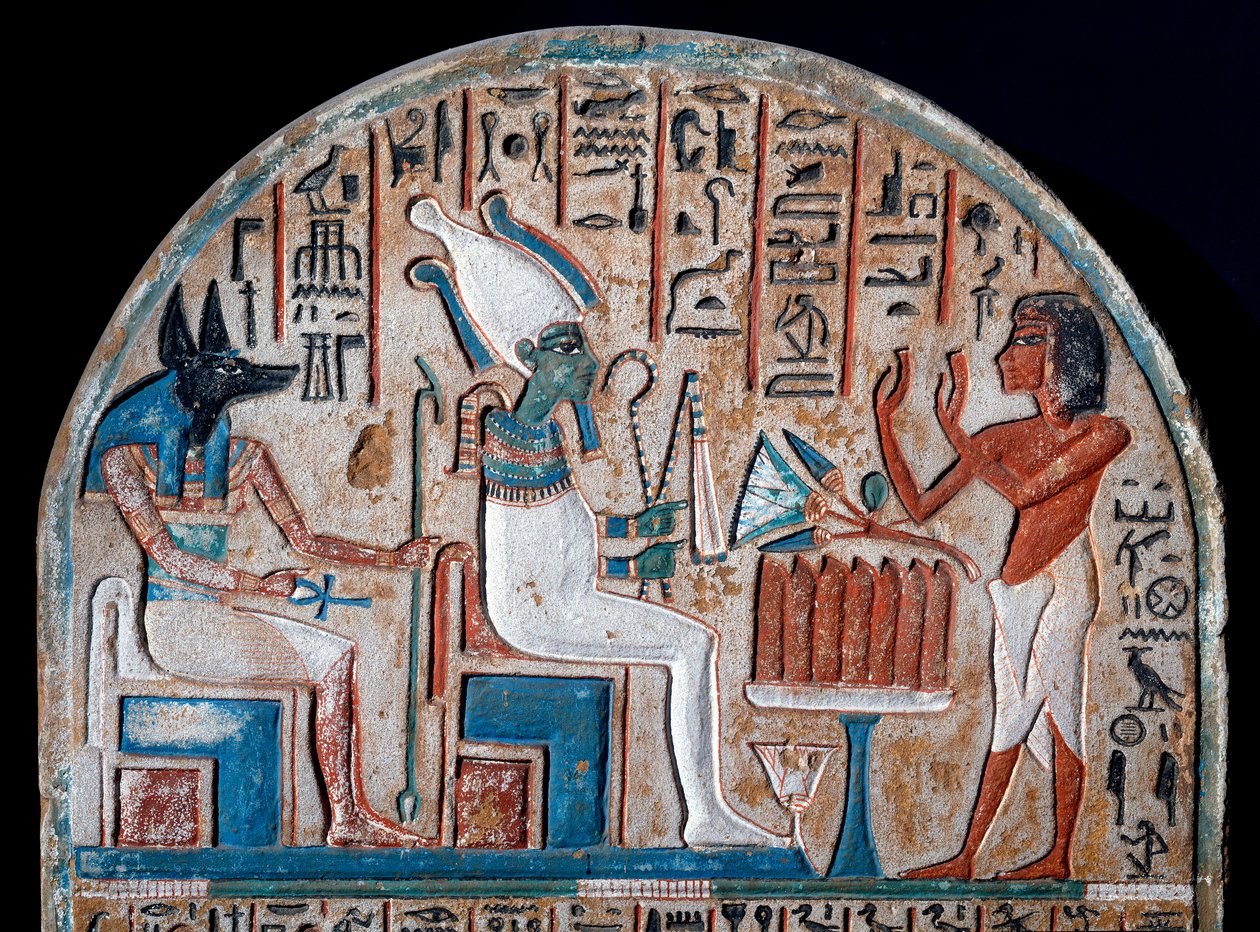 Antichità egiziana: Stele di Nanai rappresentante il culto di Osiride e Anubi, divinità dei morti che tiene la chiave della vita a forma di croce ansata (Ankh). Calcare dipinto. Fine della XVIII dinastia. XIV secolo a.C. Torino, Museo Egizio da Egyptian 18th Dynasty