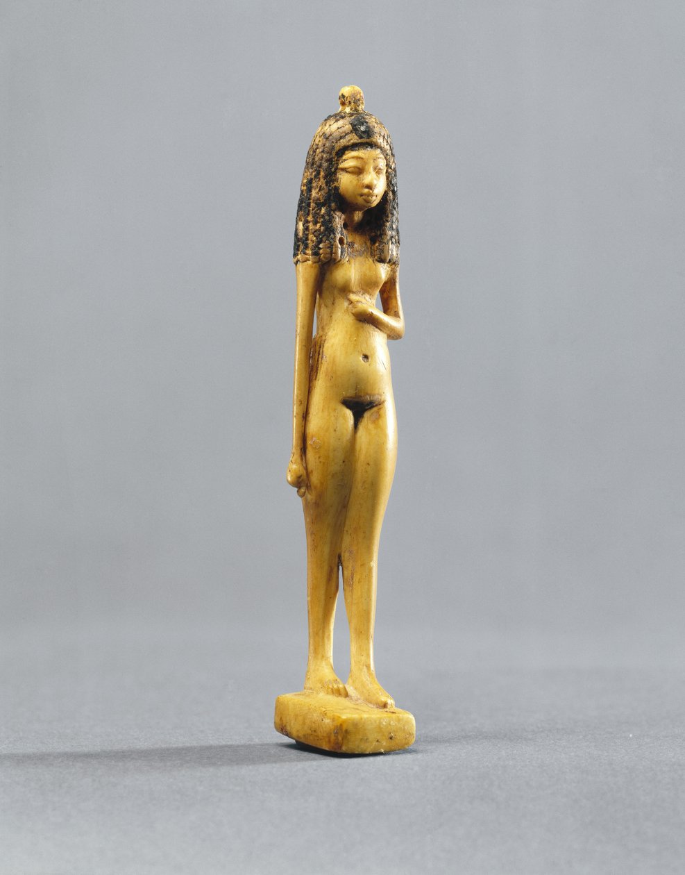 Statuetta di una ragazza nuda, Nuovo Regno, c.1390-1353 a.C. da Egyptian 18th Dynasty