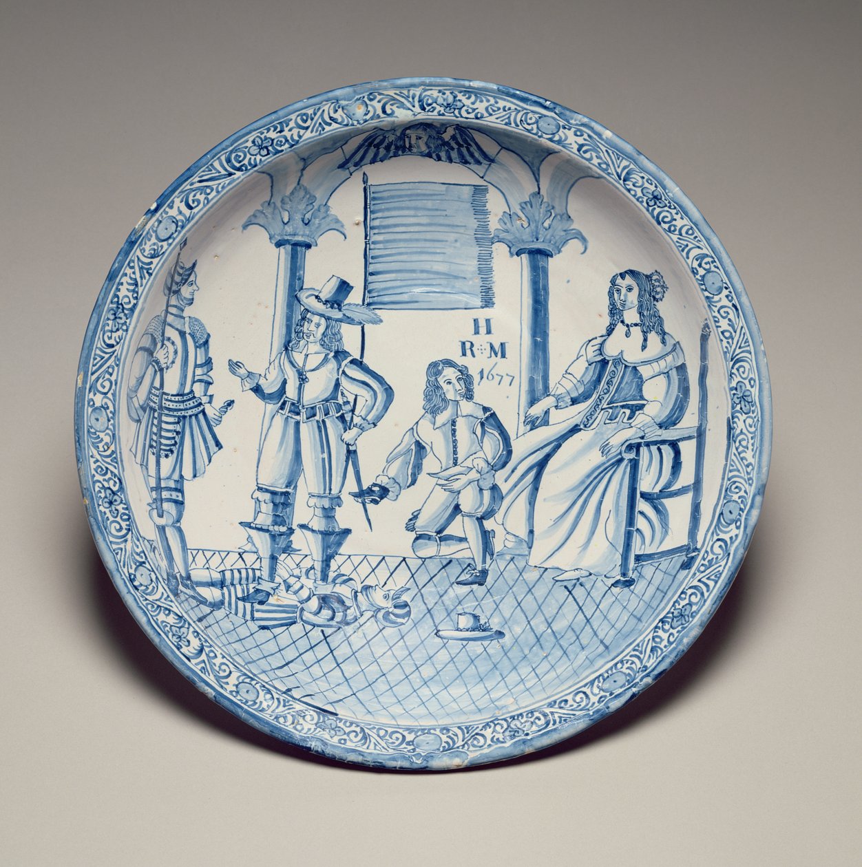 Piatto con la Regina Caterina seduta mentre un Cavaliere inginocchiato le prova una scarpa, 1677 da English School
