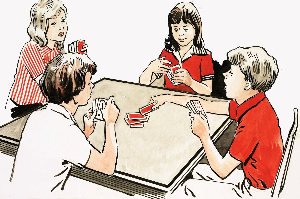 Quattro bambini che giocano a carte da English School