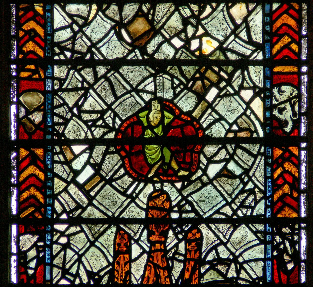 Finestra w39 raffigurante una figura (bizzarra!) tra grisaille da English School