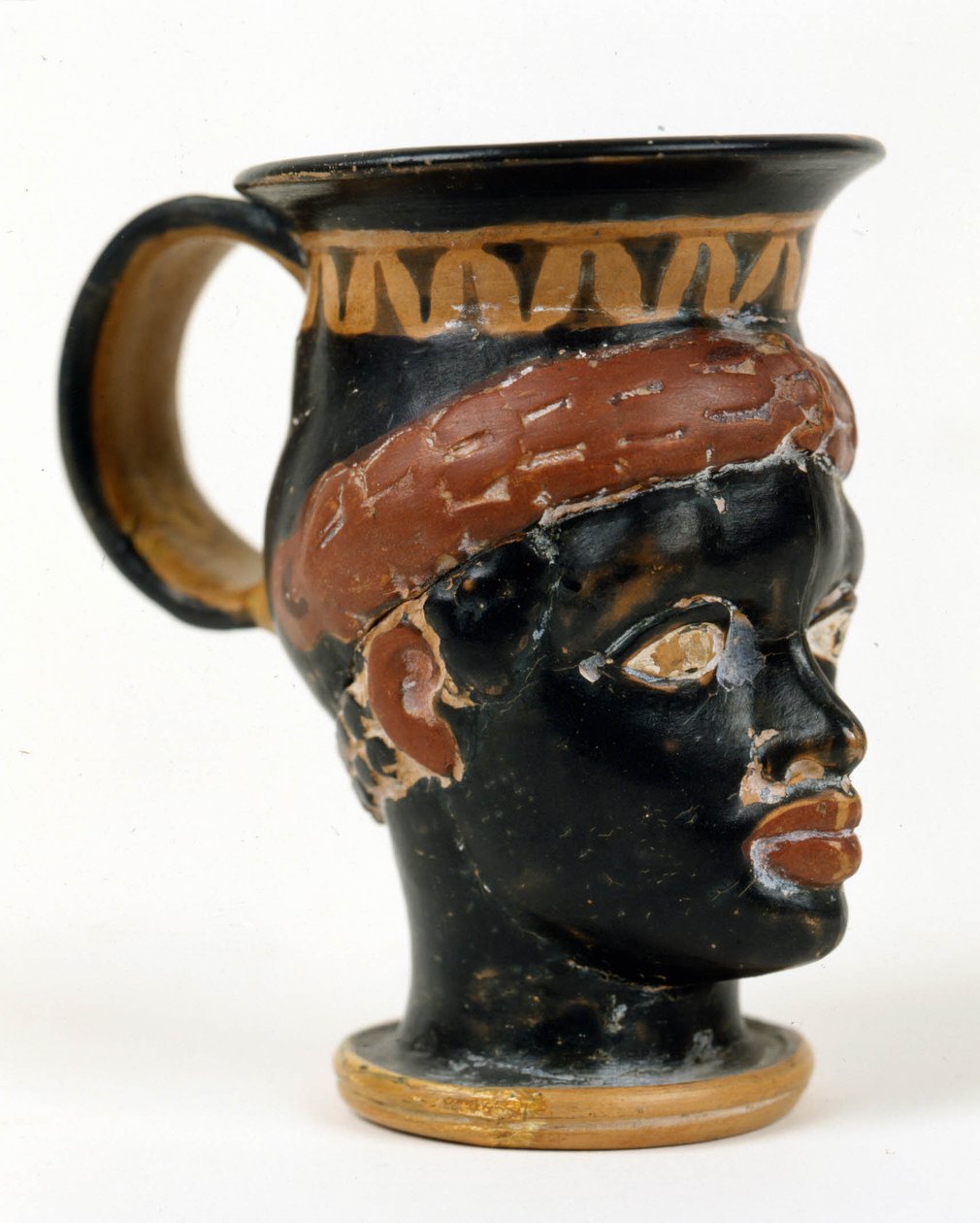 Vaso etrusco a forma di testa di uomo nero. Museo Nazionale di Tarquinia da Etruscan Etruscan