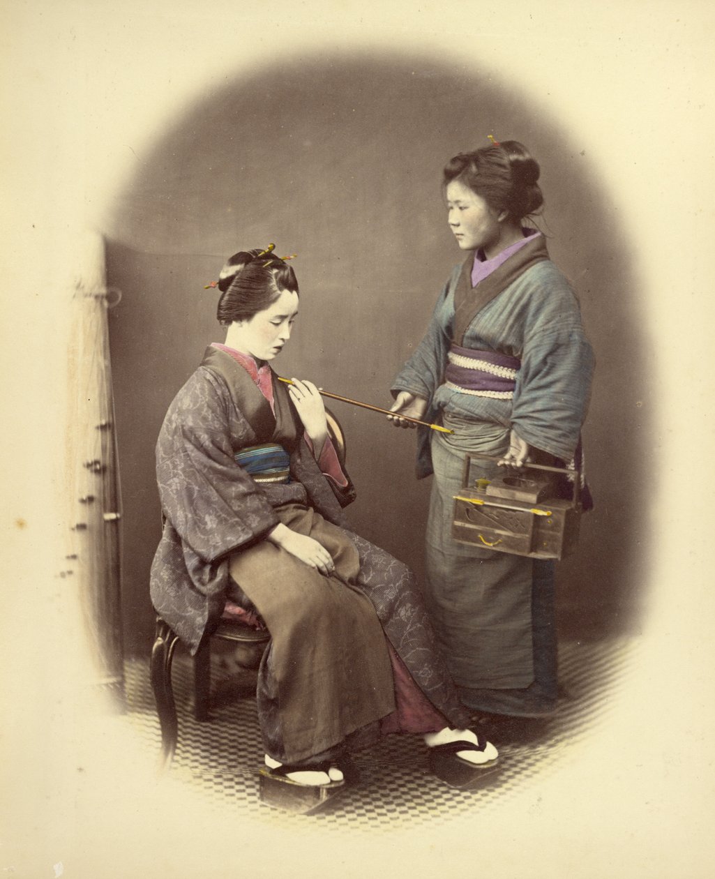 Giovane donna con la pipa da Felice Beato