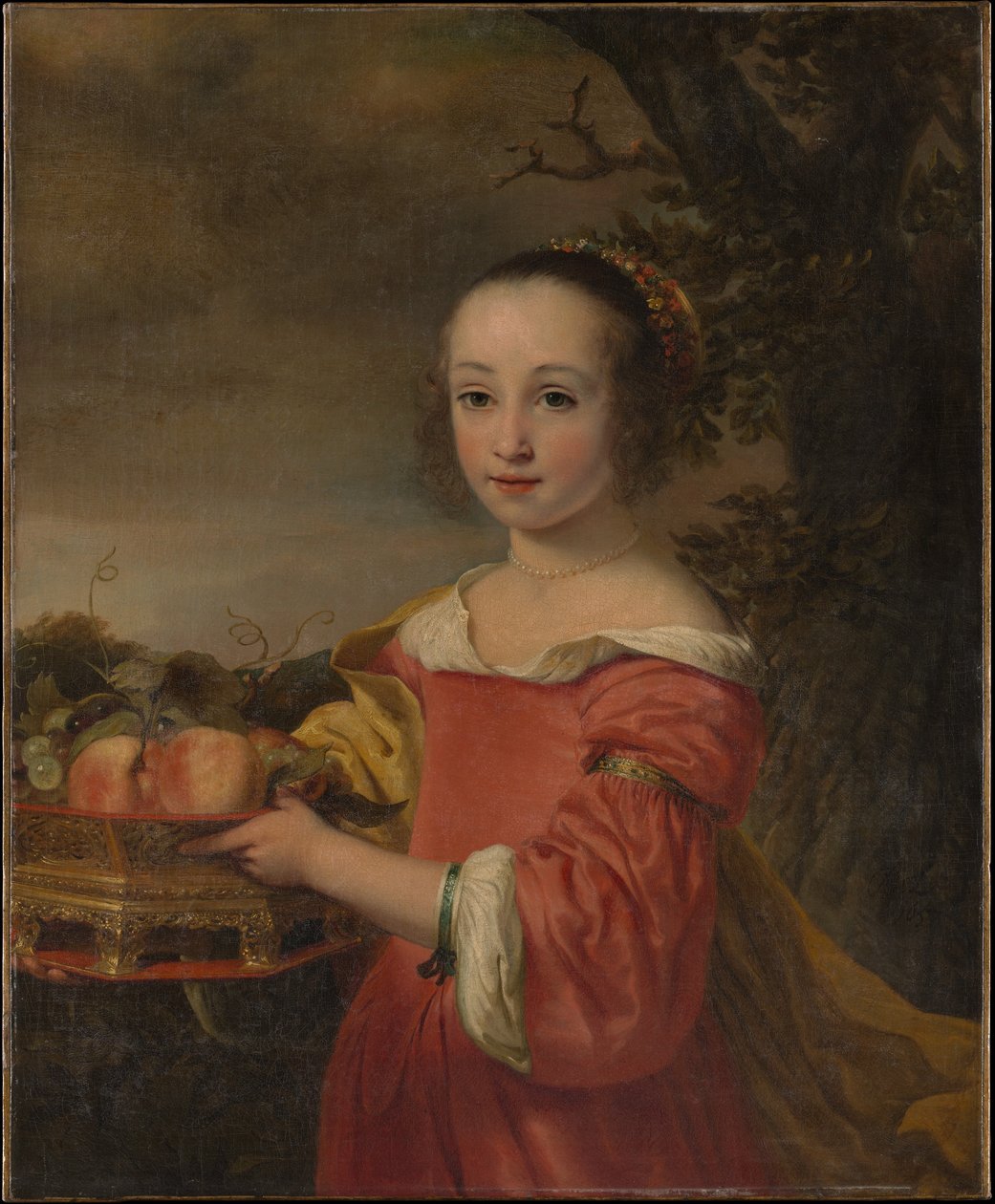 Petronella Elias con un cesto di frutta da Ferdinand Bol