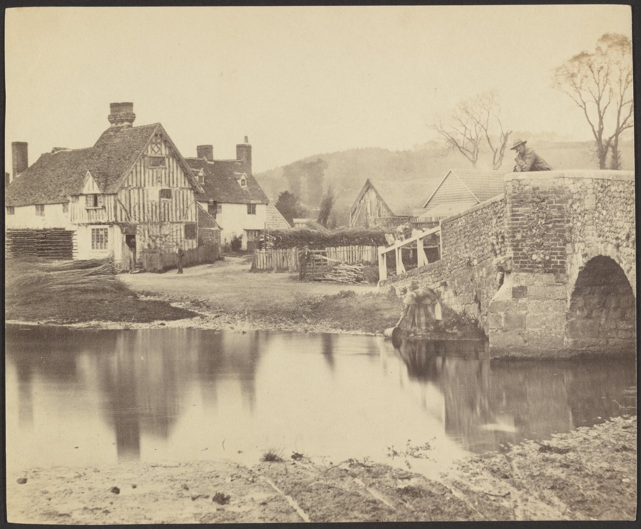 [Veduta di una casa al di là di un fiume con un ponte sulla destra]. da Francis Bedford