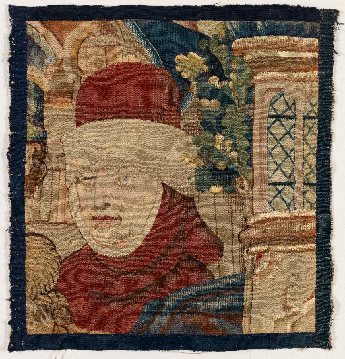 Piccolo frammento di arazzo raffigurante la testa di un uomo da Franco Flemish School