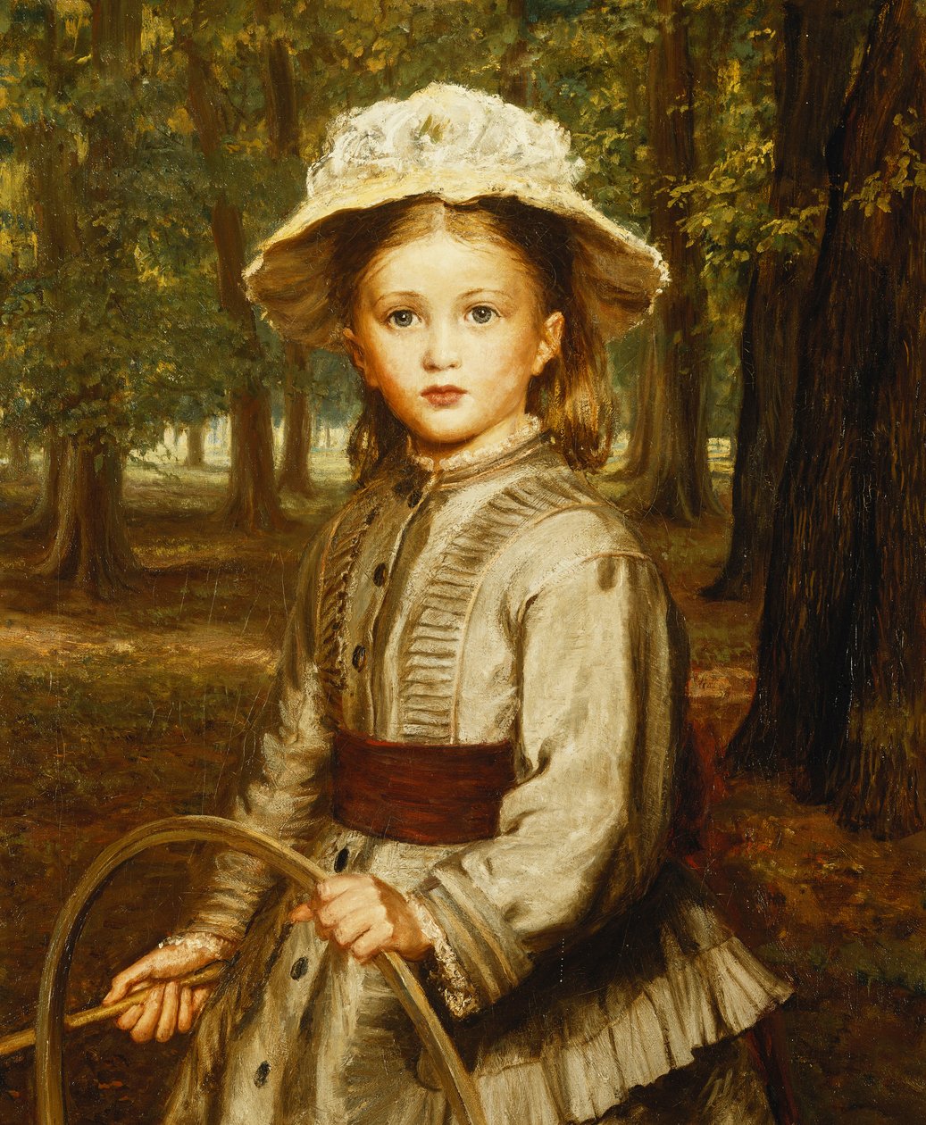 Una giovane ragazza che gioca con un cerchio da Frederick Bacon Barwell
