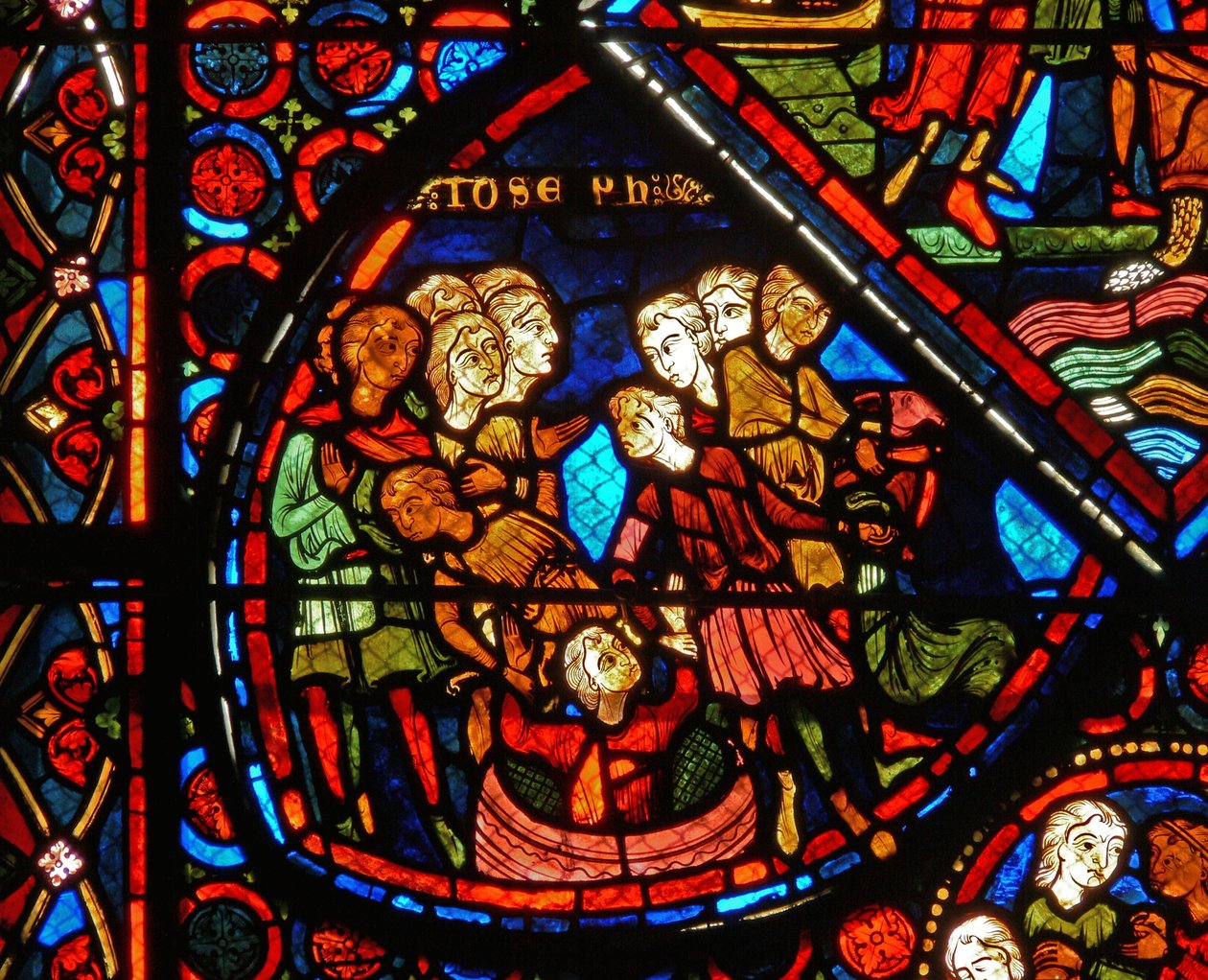 Dettaglio di una vetrata raffigurante scene della storia di Giuseppe da French School