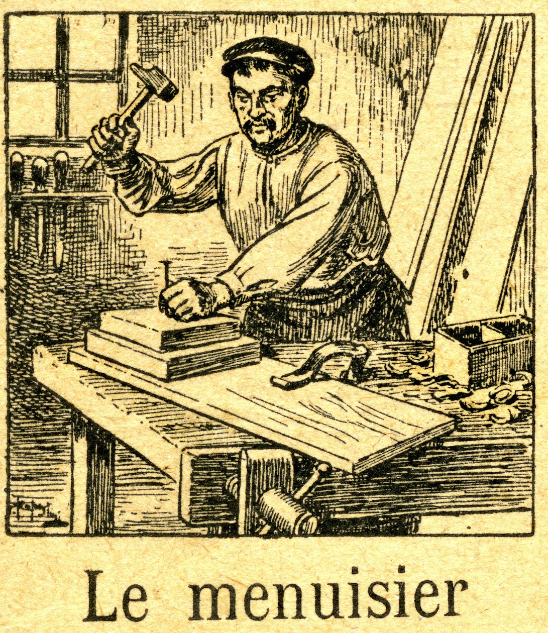 Falegname che pianta una punta (chiodo) con un martello in un assemblaggio di tavole sul suo banco. Incisione di un sillabario (libro di lettura) intorno al 1920. da French School