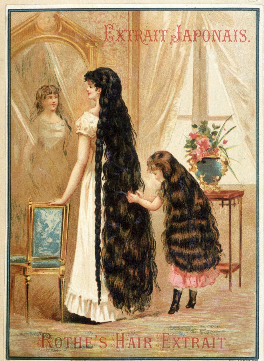 Giovane donna e la sua bambina con capelli molto lunghi e abbondanti - pubblicità per l