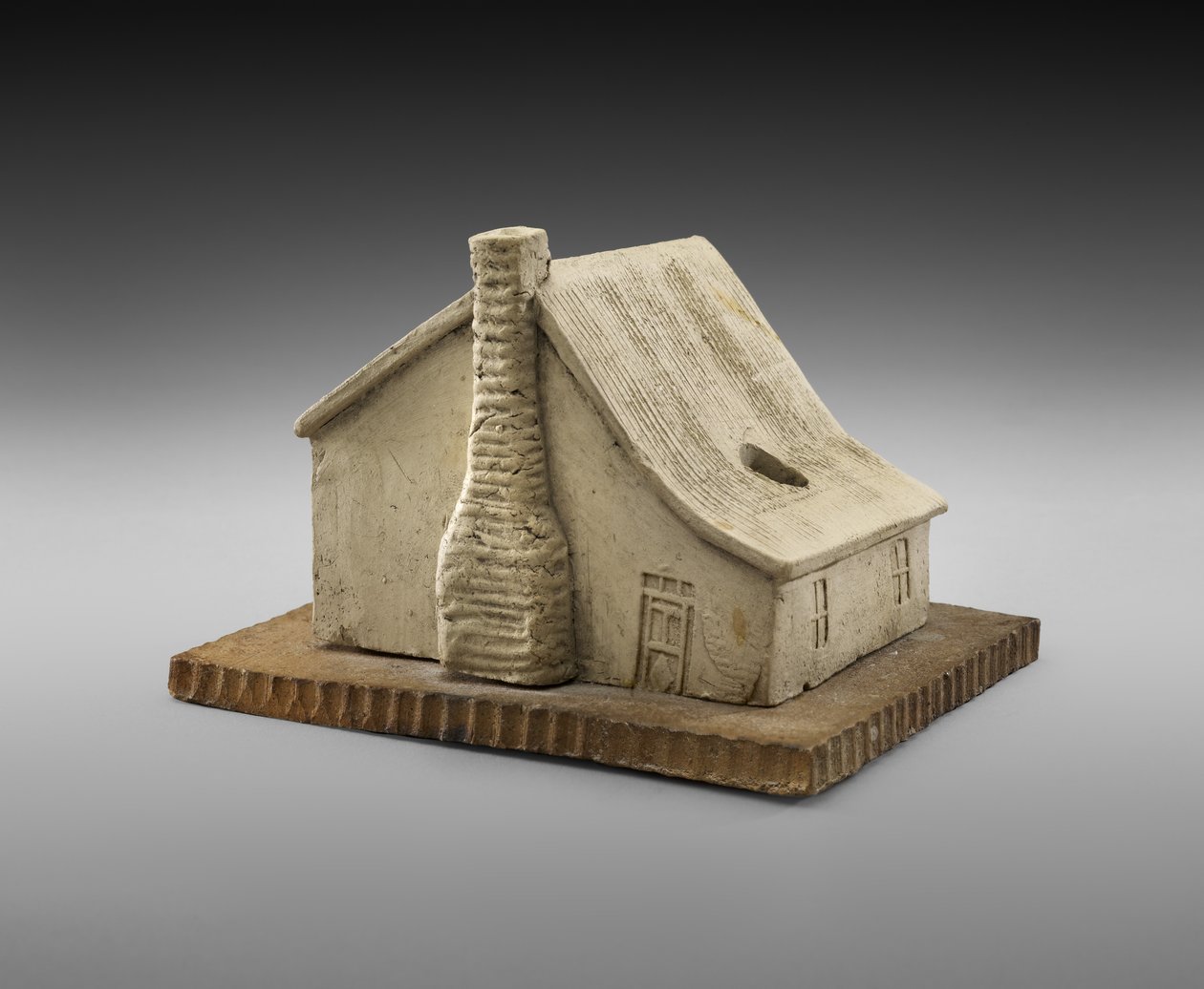 Calamaio a forma di capanna di tronchi da George E. Ohr
