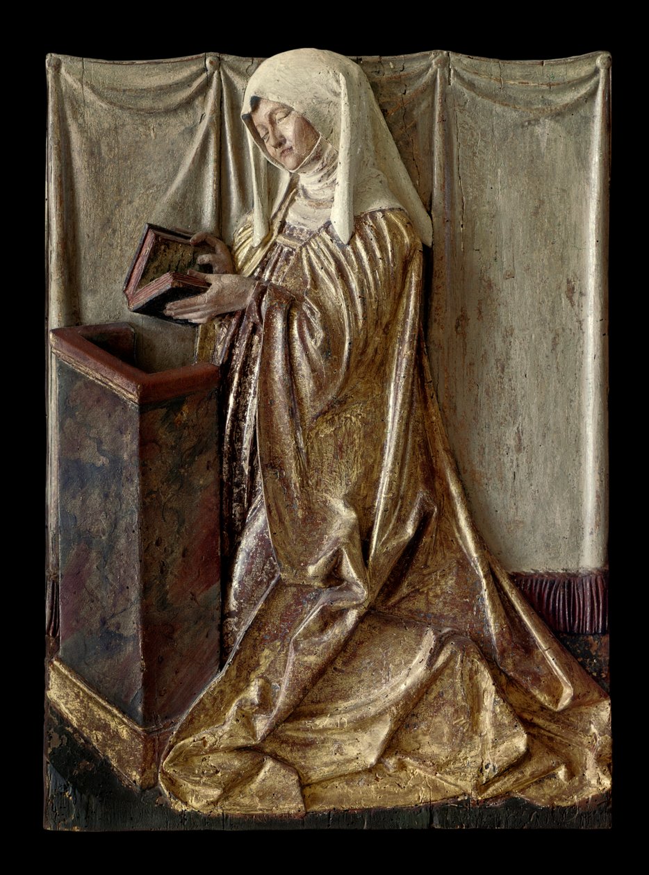 Donatore inginocchiato. Frammento di un altare scolpito in legno policromo. Dalla Svevia. Circa 1520. Parigi, Museo del Louvre da German School