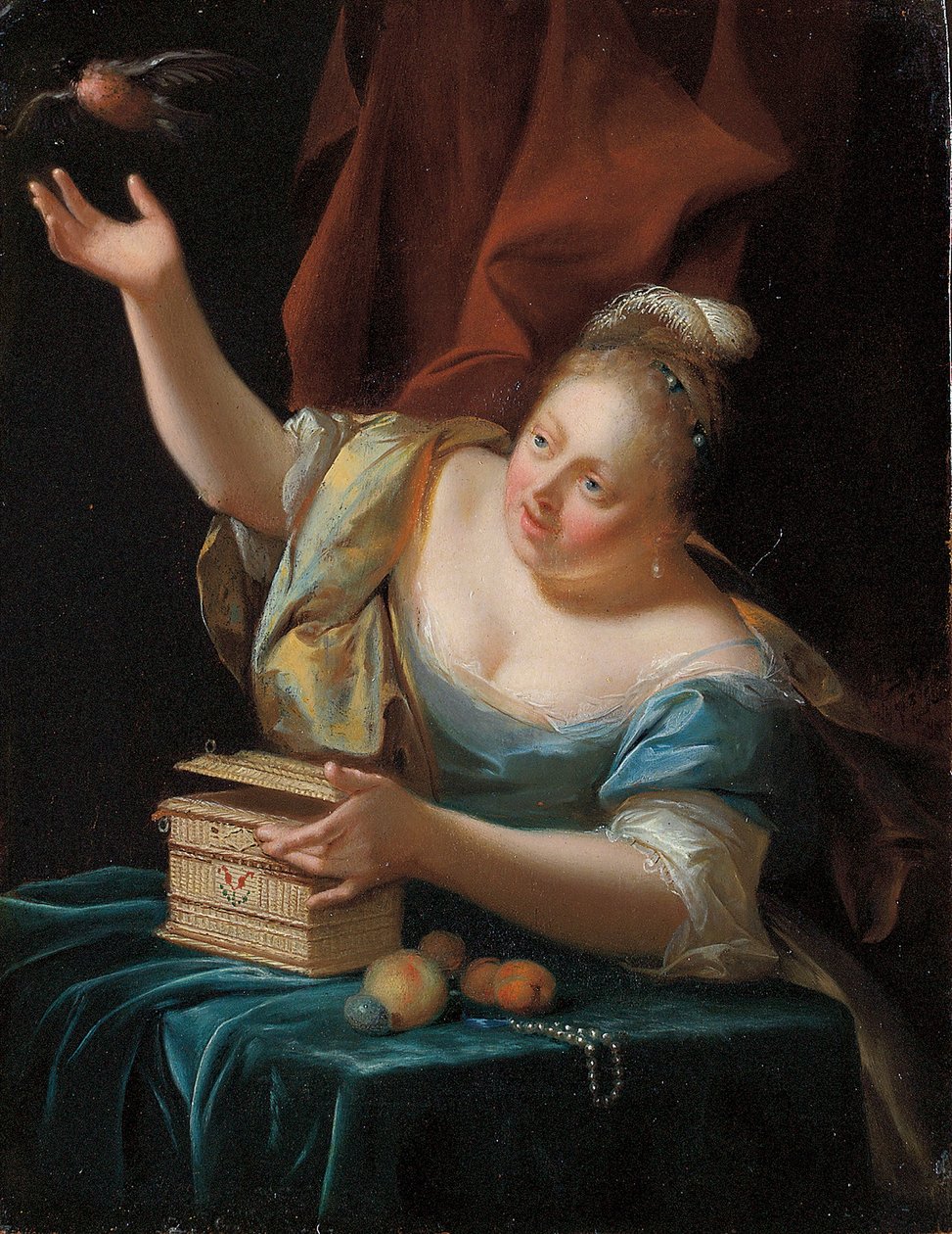 Una donna, seduta a un tavolo in costume di fantasia, libera un uccellino dalla sua gabbia da Godfried Schalcken