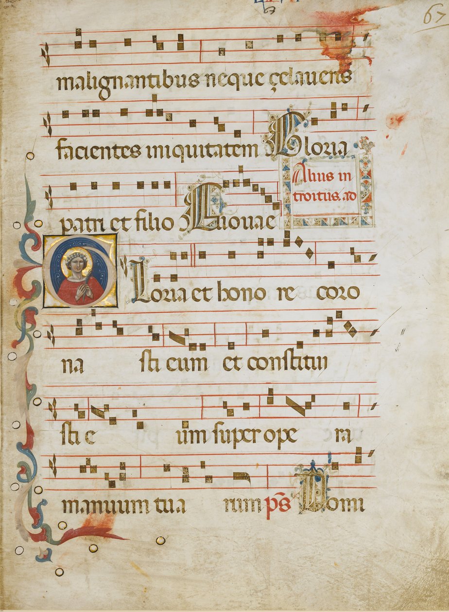 Foglio di manoscritto con una santa femminile possibilmente Dorotea in una iniziale G da Illustratore