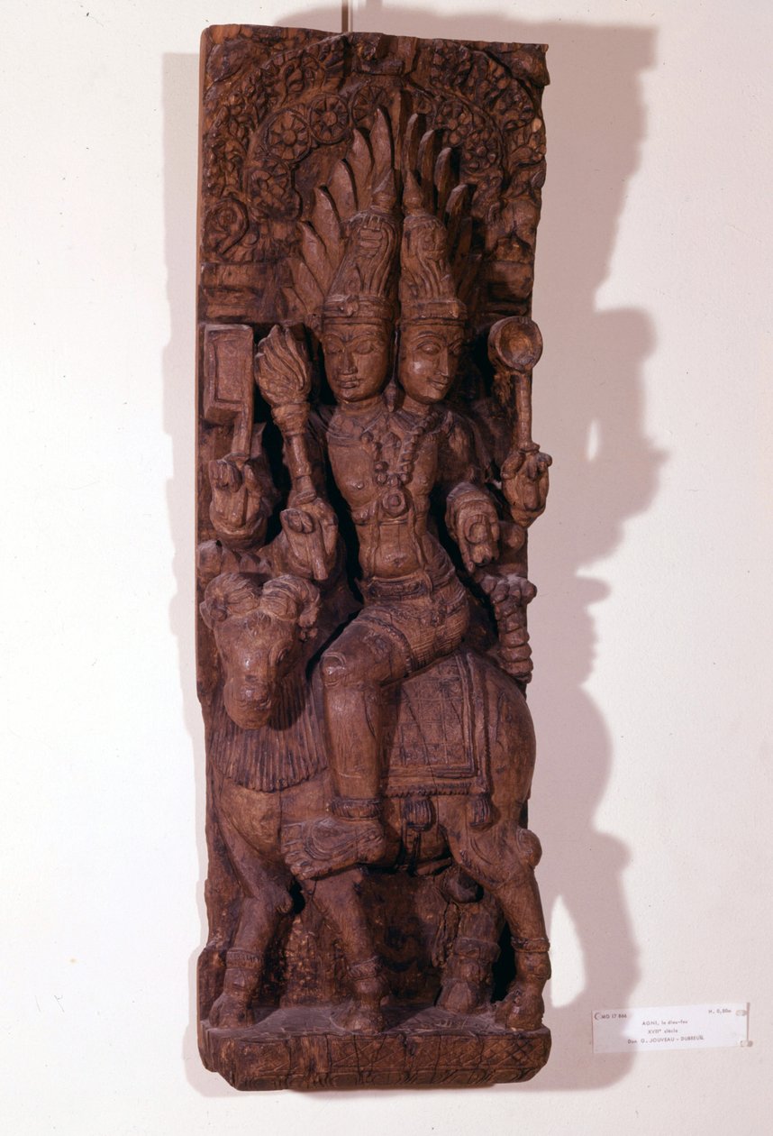 Agni, dio del fuoco, raffigurato con due teste (bicefalo) su un ariete, secondo la mitologia indù. Scultura in legno del XVII secolo. Parigi, Musée Guimet. da Indian School
