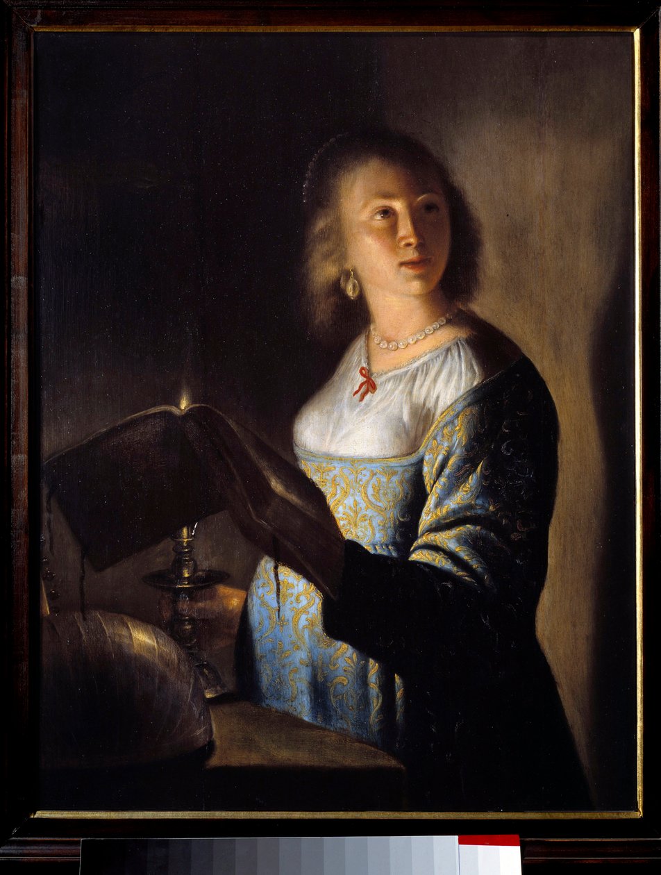 Giovane ragazza con una candela da Isaac de Jouderville