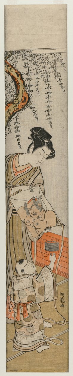 Giovane uomo e bambino con un aquilone da Isoda Koryusai