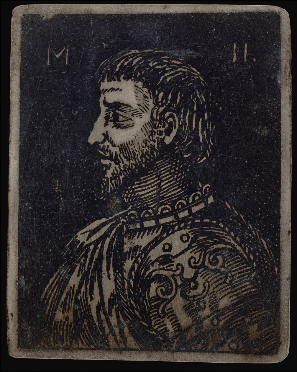 Busto di un uomo barbuto con corazza ornata rivolto a sinistra da Italian 16th Century