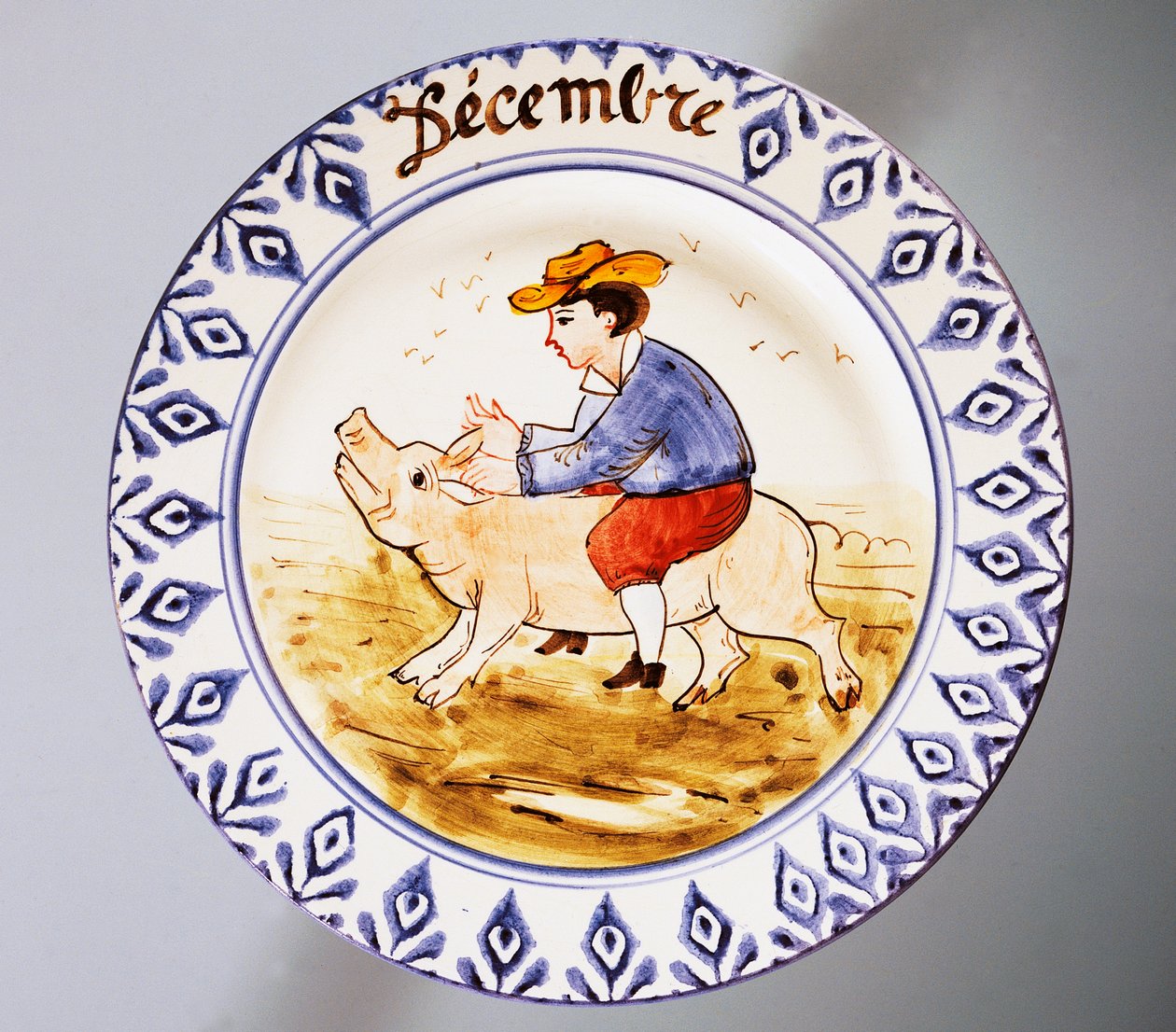 Piatto raffigurante mesi, dicembre, terracotta, manifattura Nove di Bassano, Veneto, Italia, XX secolo. da Italian School