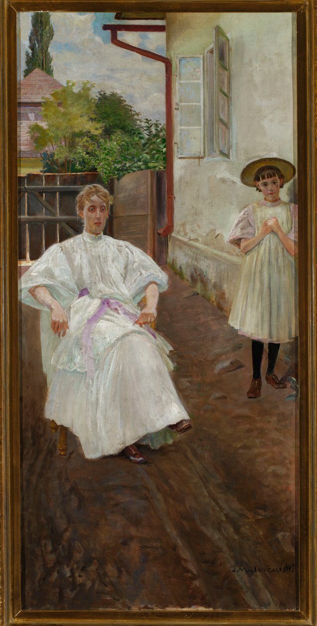 Davanti alla casa: la moglie e la figlia dell