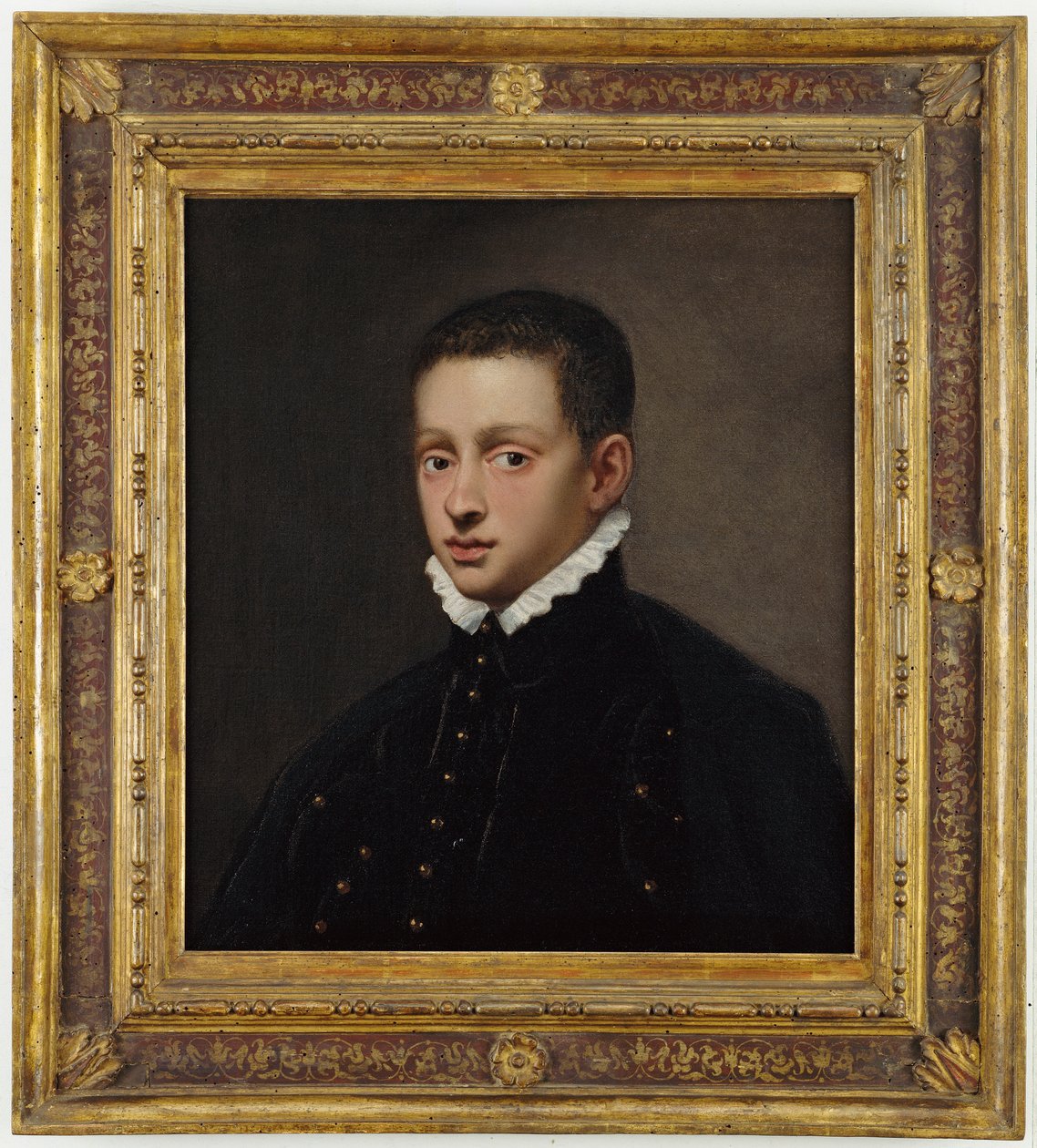 Ritratto di un ragazzo, busto, in un farsetto nero con colletto bianco da Jacopo Robusti Tintoretto