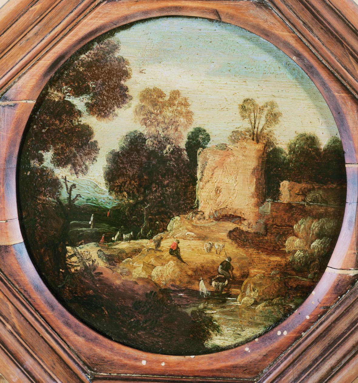 Paesaggio boscoso con pastori e capre presso una pozza da Jan Asselyn