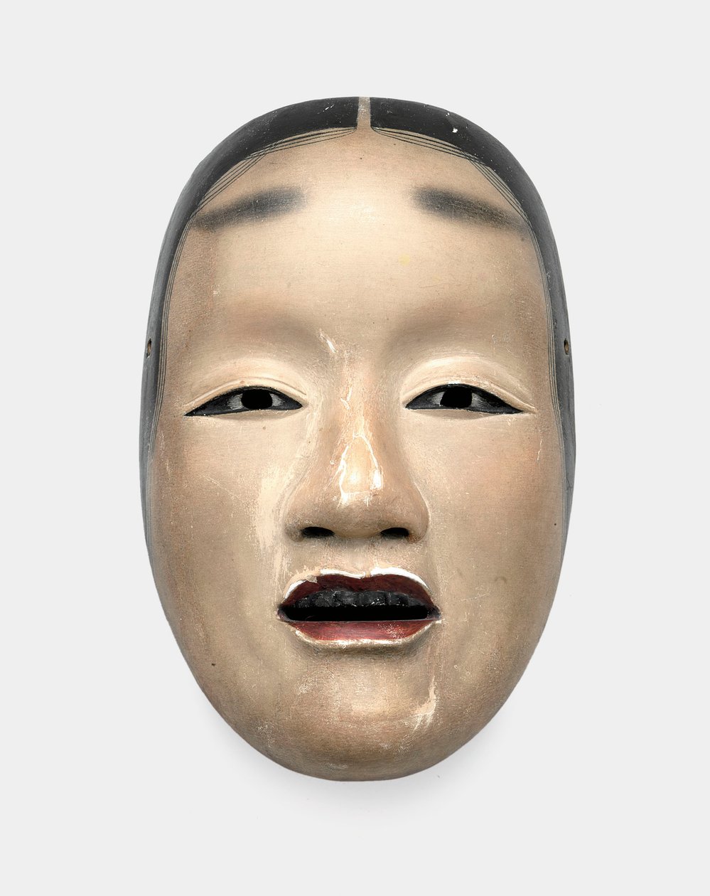 Una maschera di legno con base di gofun, dipinta con sumi per i capelli, gli occhi e i denti e rosso per le labbra da Japanese School