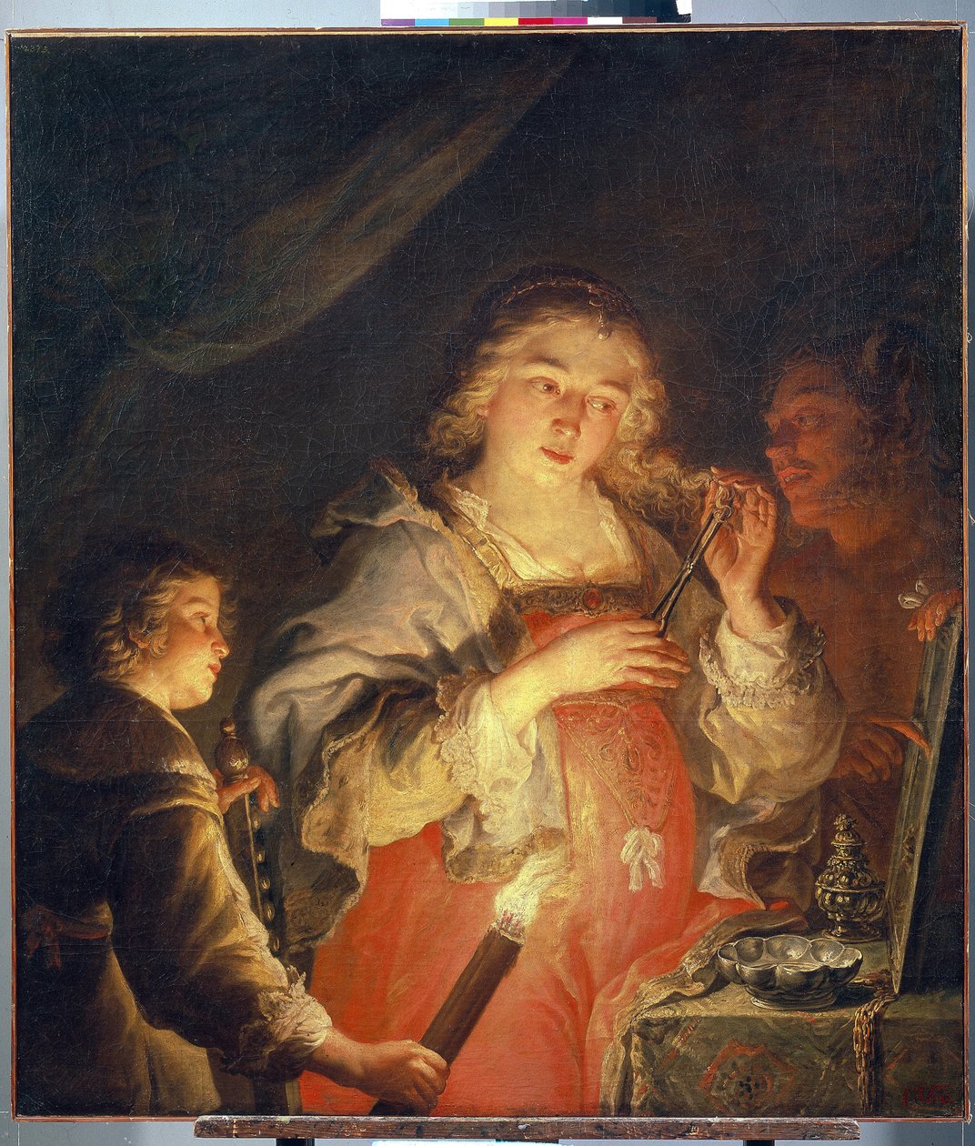 Allegoria della vanità. Una giovane donna bionda si taglia una ciocca di capelli con un paio di forbici davanti a uno specchio tenuto da un uomo, un bambino la illumina con una torcia. da Joachim von Sandrart