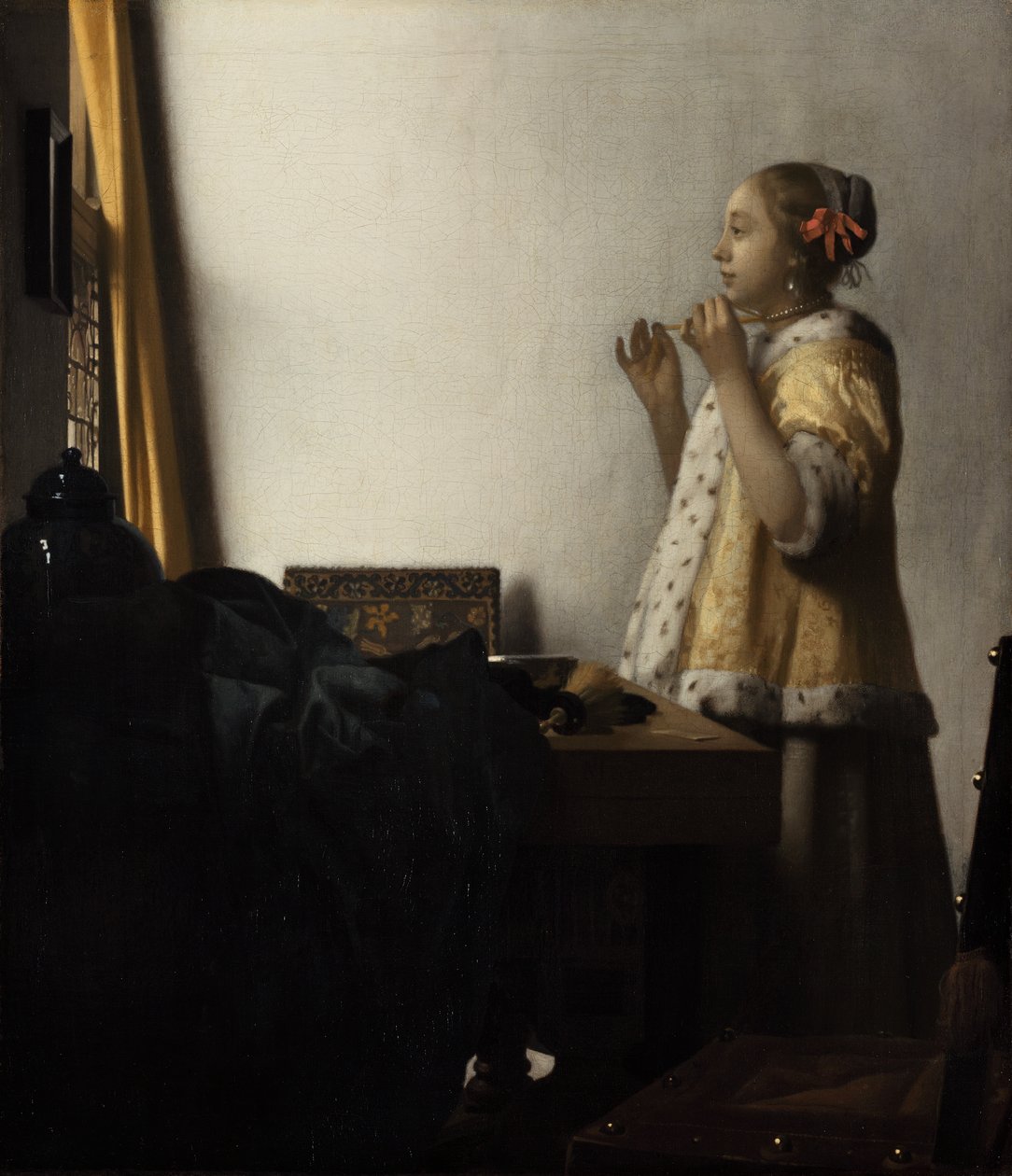 Giovane donna con collana di perle da Johannes Vermeer