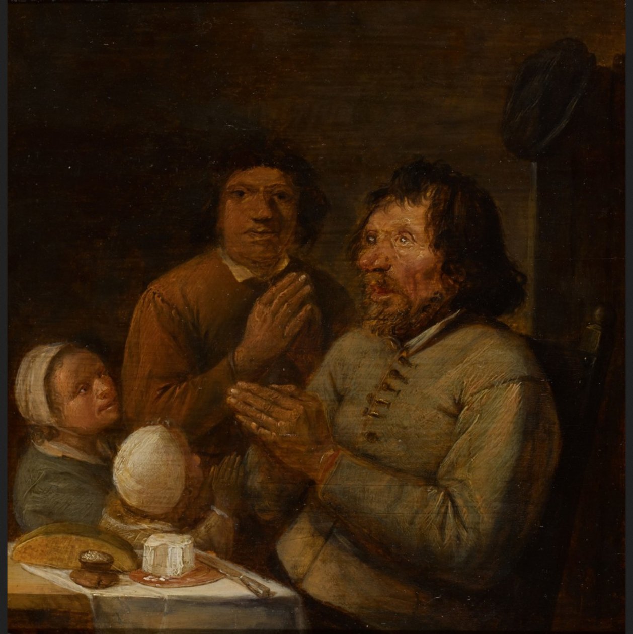 Interno con una famiglia di contadini in preghiera da Joos van Craesbeeck